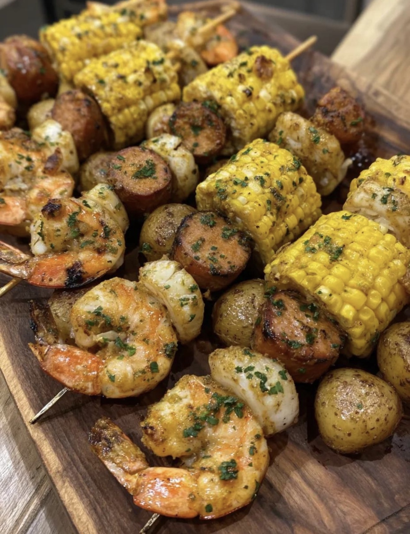 Shrimp boil skewers with sausage, corn and potatoes